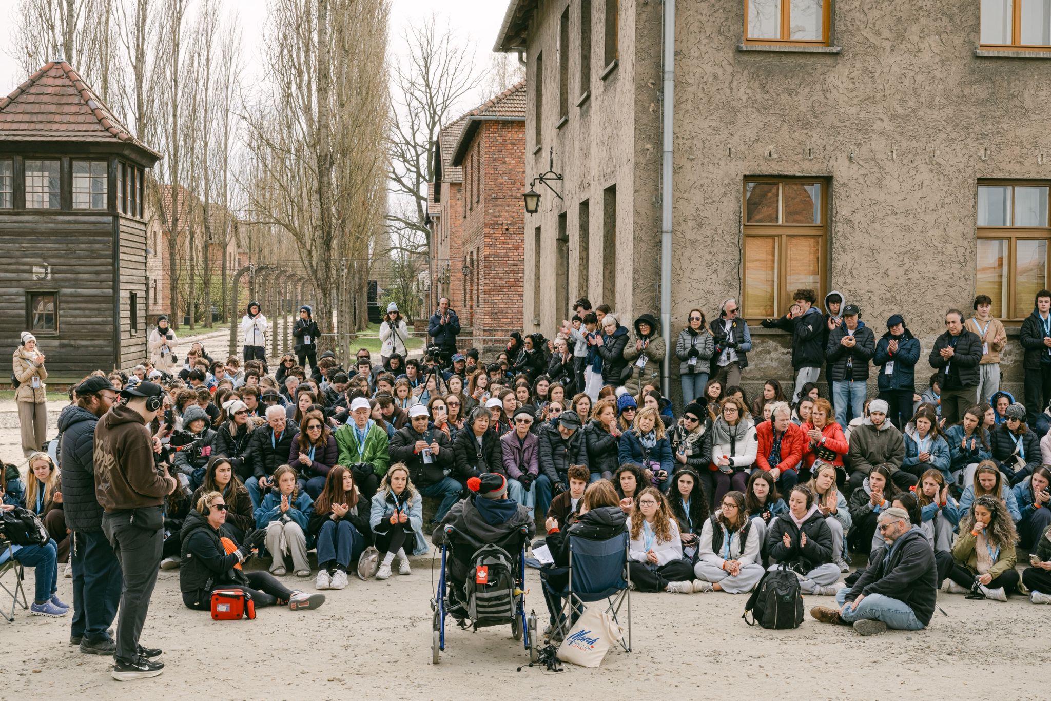 Harry Rozendaal speaking to participants at Auschwitz during the 2026 March of the Living