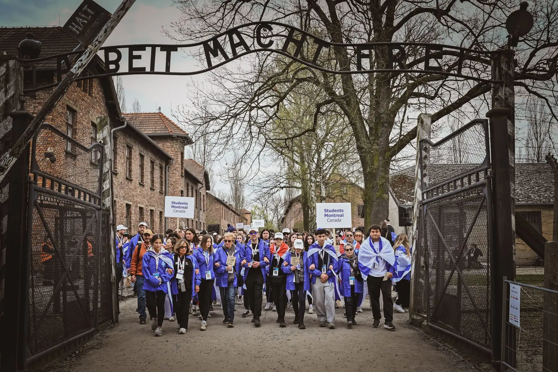 The Montreal delegation walking through the Auschwitz gate