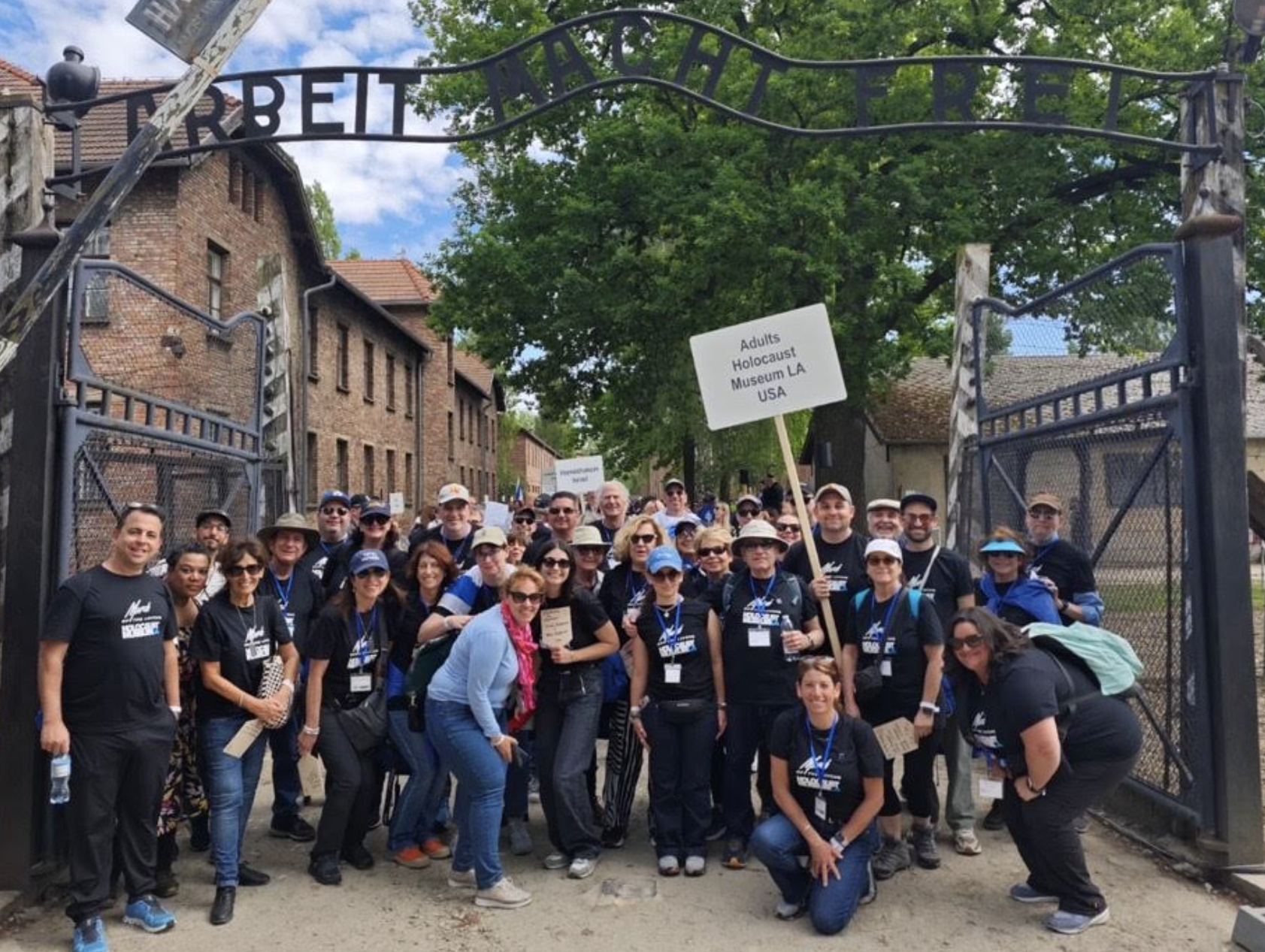Jessica Handler leading the Holocaust Museum LA delegation at Auschwitz