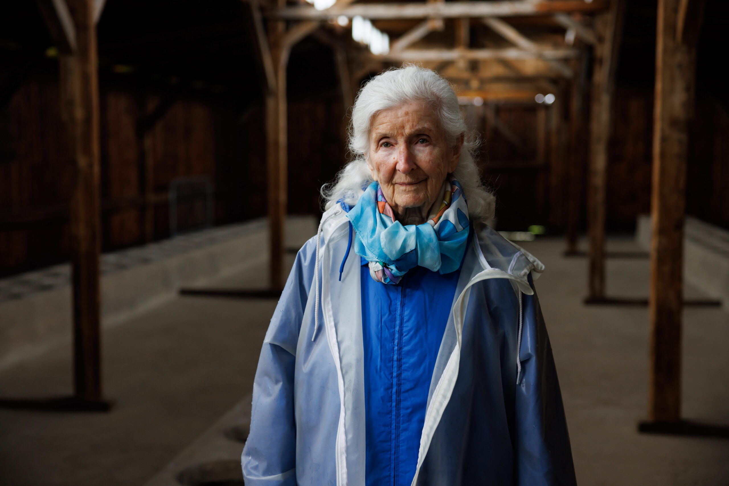 April 18th, 2023 - Auschwitz, Poland. 95 yo Holocaust survivor Hedy Bohm was born in Transylvania, Romania, an only child to Ignach and Larjbet. Hedy was attending a Jewish all girl school until the 10th grade. In April 1944 Hedy was sent to Oradea ghetto in Romania, from there she was deported to Auschwitz-Birkenau camp. She was doing labor work in an ammunition factory. Hedy was freed by the American forces in April 1945. At 17 she joined a group of orphans from Hungary and received a visa to Canada, where she now lives. Hedy is photographed at Auschwitz-Birkenau camp.   (Ziv Koren/Polaris)