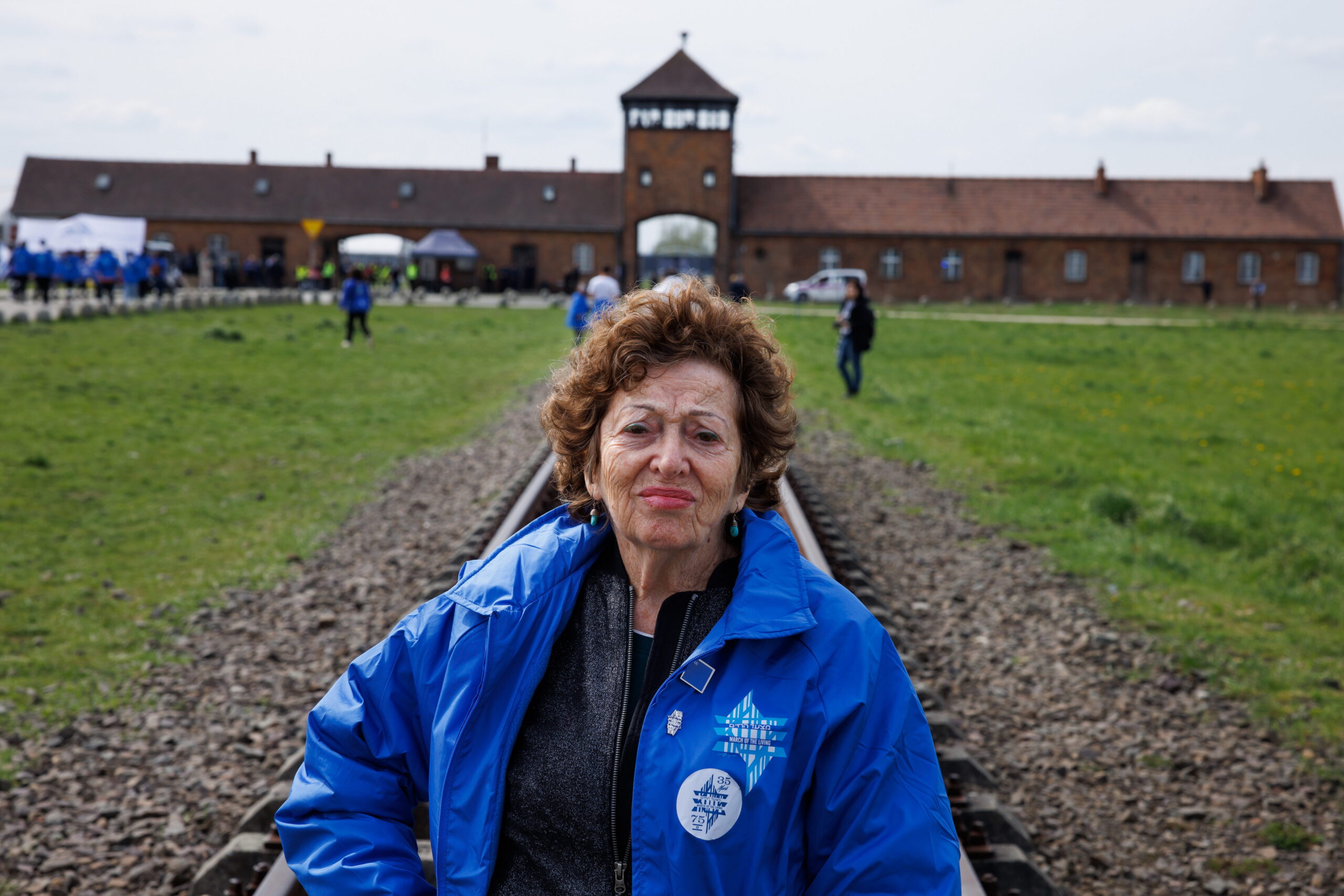 April 18th, 2023 - Auschwitz-Birkenau, Poland. 87 yo Holocaust survivor Shoshana Trister was born in Poland. She was only 4 when WW2 broke. Before the war began she remembers a beautiful life. In 1939 deportation began, Children were separated from their parents, the men were taken to do labor work. Shoshana's mother hid Shoshana and her brother, each in a crate. Shoshana sat shaking and silence in the crate. Around she heard screaming and shots fired. When it was quiet she stood up and peeked. What she saw she can never forget, German officers holding an infant from his legs, shaking him and throwing him onto the stone paved ground. A lot of blood splattered. The joy and happy sounds they made have scarred and traumatized her. She stopped talking for a long time. For 23 they hid in a pit below a pigs sty pf a Polish woman. They survived on pigs food. Today Shoshana lives in Tel Aviv, Israel. (Ziv Koren/Polaris)